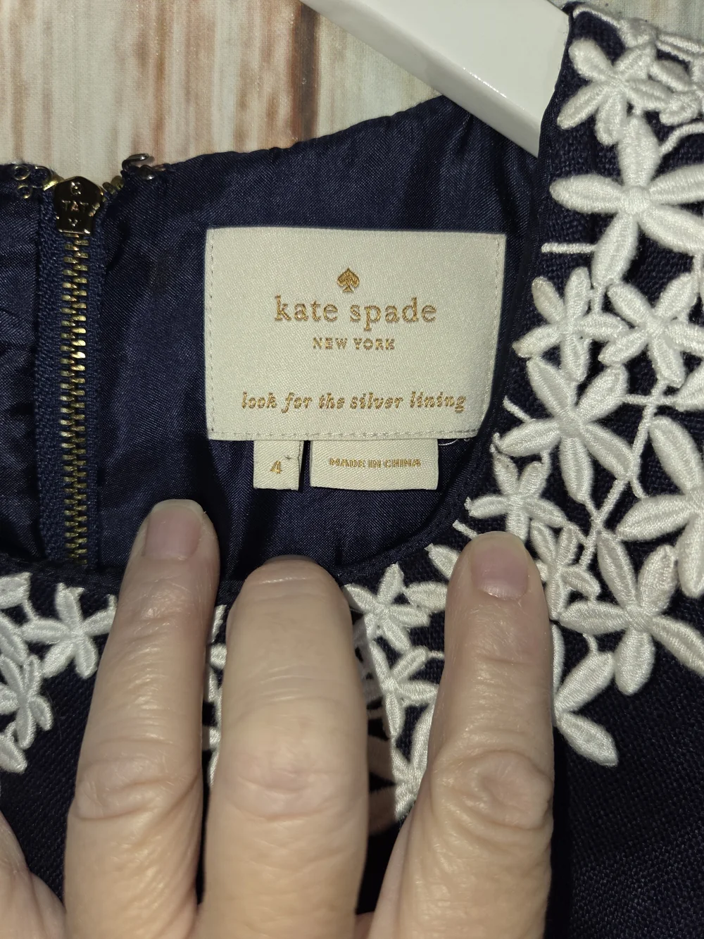 kate spade navy sleeveless sheath dress with white floral collar. Size 4